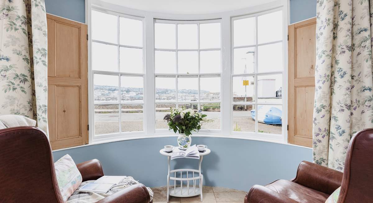 Watch the water world go by from the bay window.