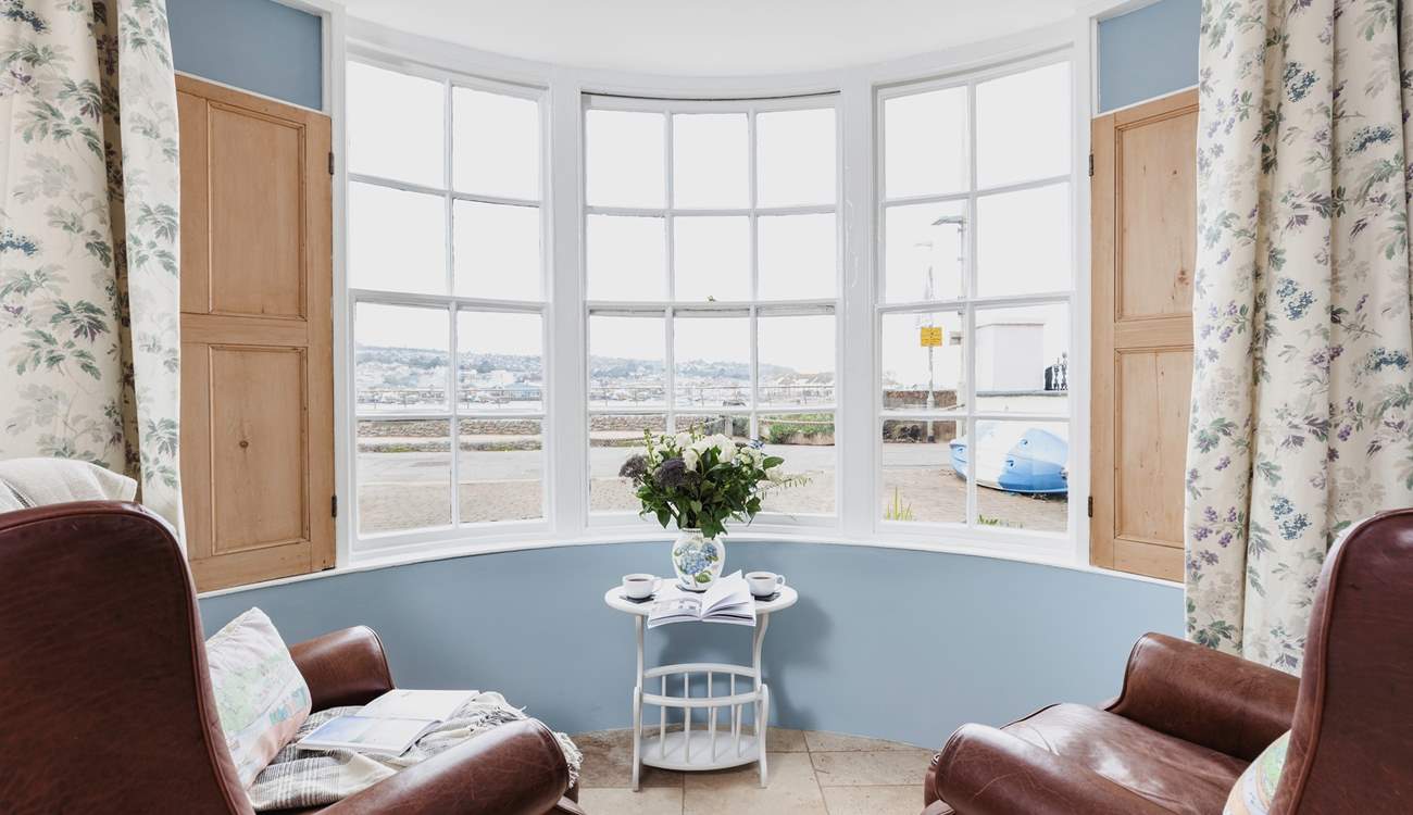 Watch the water world go by from the bay window.