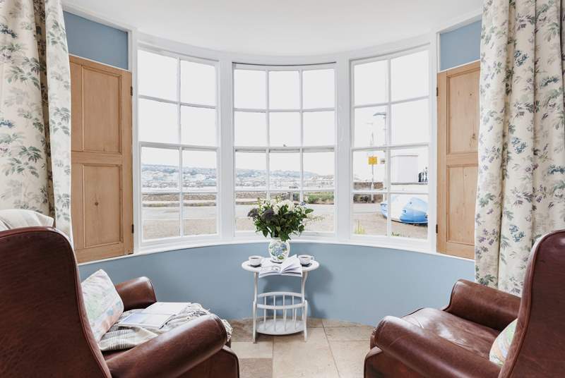 Watch the water world go by from the bay window.