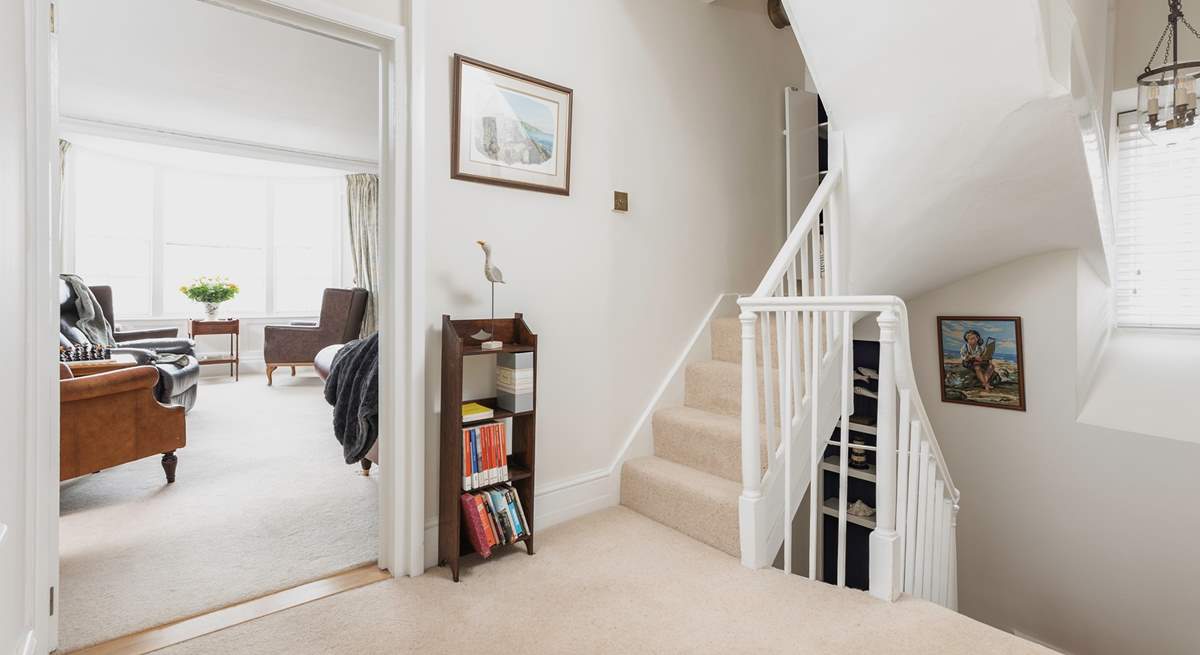 Stairs lead from the ground floor to the first floor sitting-room, bedroom 2 and the family bathroom.