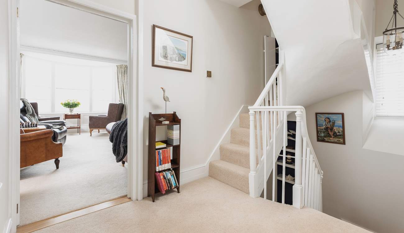 Stairs lead from the ground floor to the first floor sitting-room, bedroom 2 and the family bathroom.