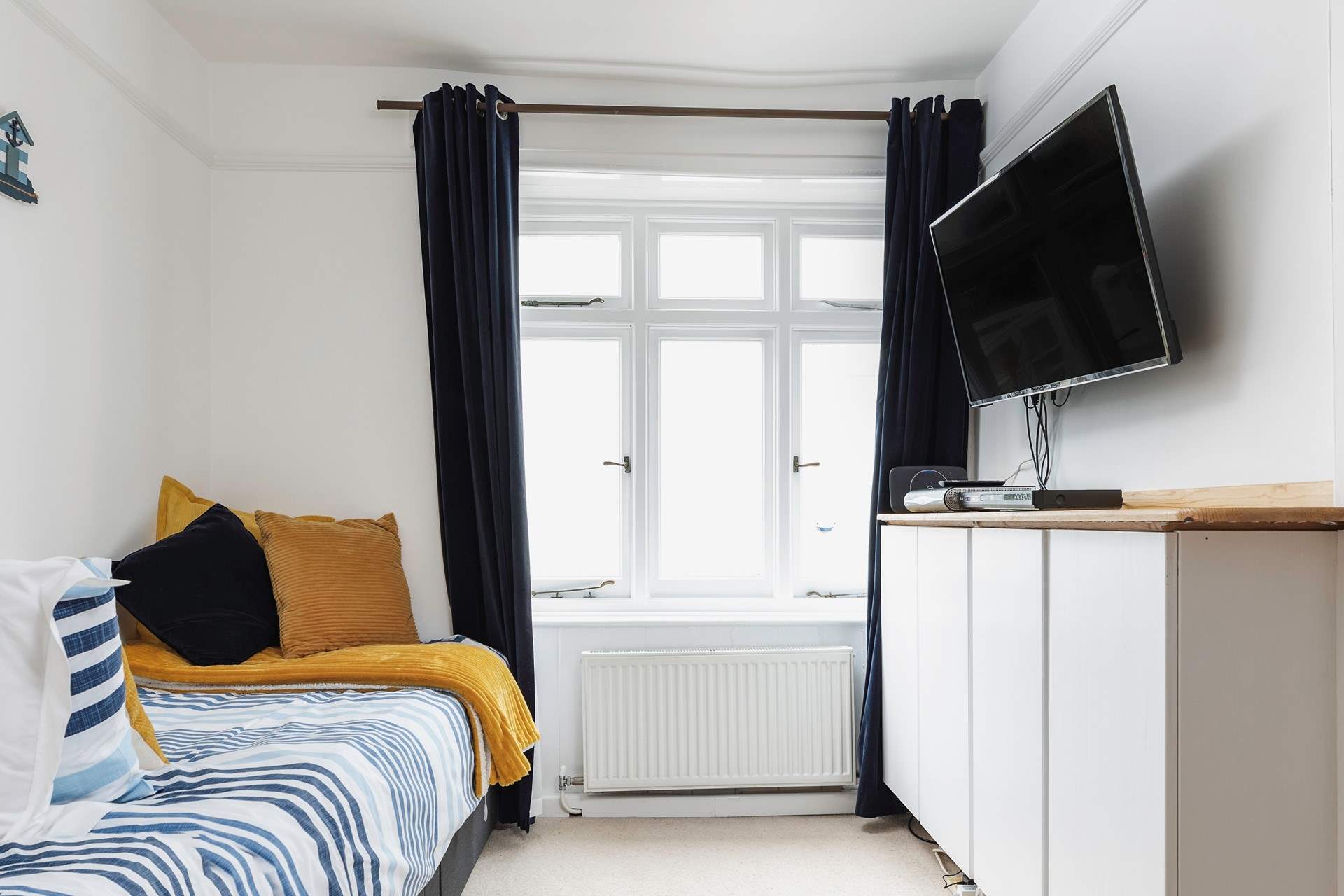 Bedroom 2 has a single bed and 'pod' bunk beds.