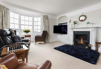 The gorgeous sitting-room on the first floor has views across of the beach and bay.