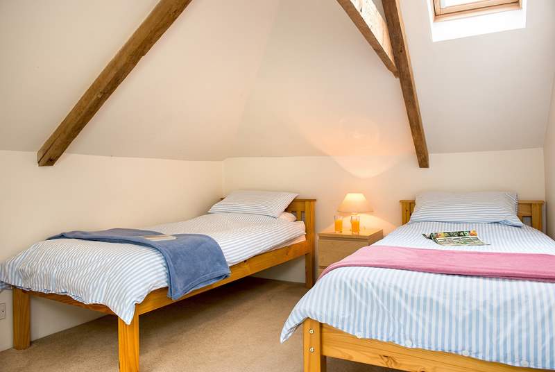 The pretty twin bedroom - again, please watch your head on the cottage beams.