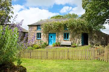 Such a pretty cottage in a tranquil setting.