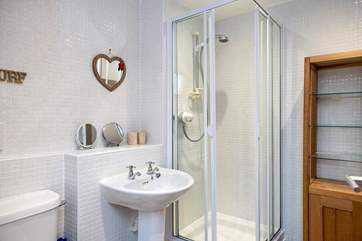 The family bathroom has plenty of space for all your lotions and potions.