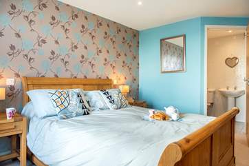 The master bedroom has an en-suite bathroom.
