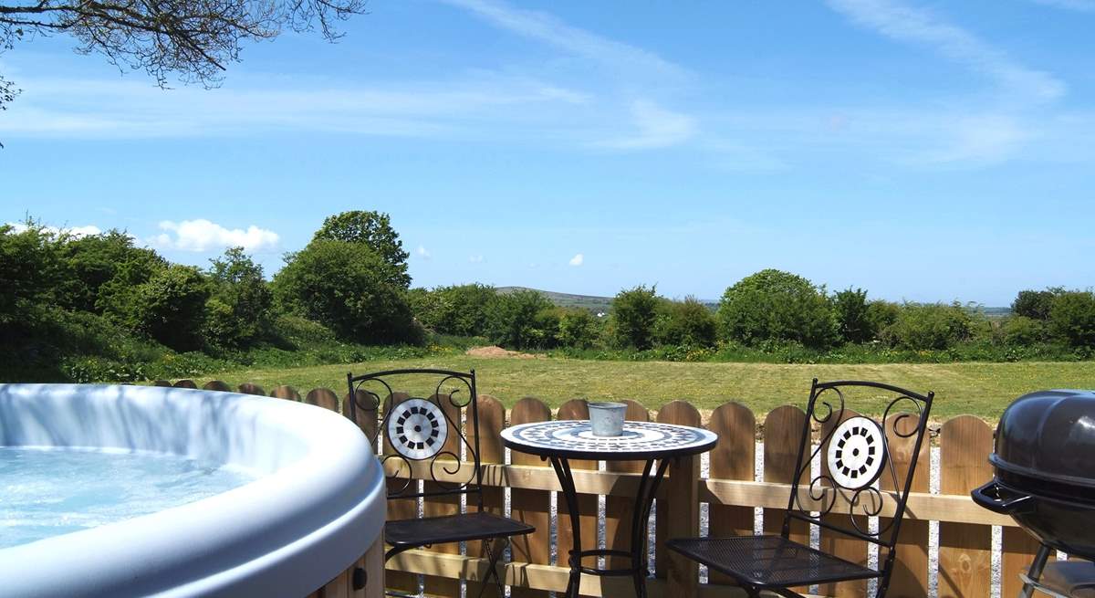 Meadow's private hot tub enclosure, with lovely views across the meadow and beyond. (Please note there is an additional charge for the hot tub).