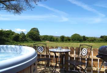 Meadow's private hot tub enclosure, with lovely views across the meadow and beyond. (Please note there is an additional charge for the hot tub).