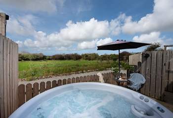 Enjoy your private bubbling hot tub.