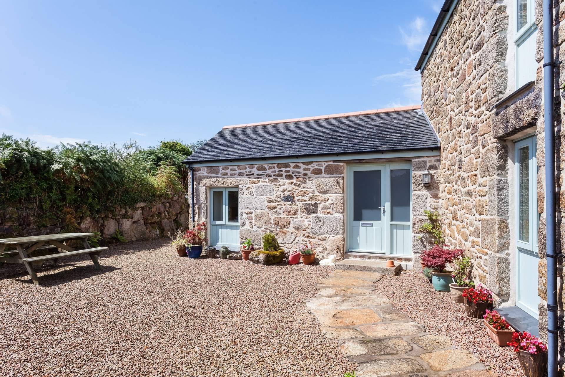 The lovely sheltered courtyard at the front of the property.