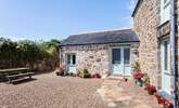 The lovely sheltered courtyard at the front of the property. - Thumbnail Image