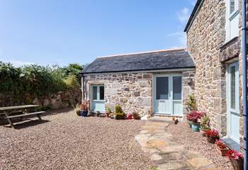 The lovely sheltered courtyard at the front of the property.