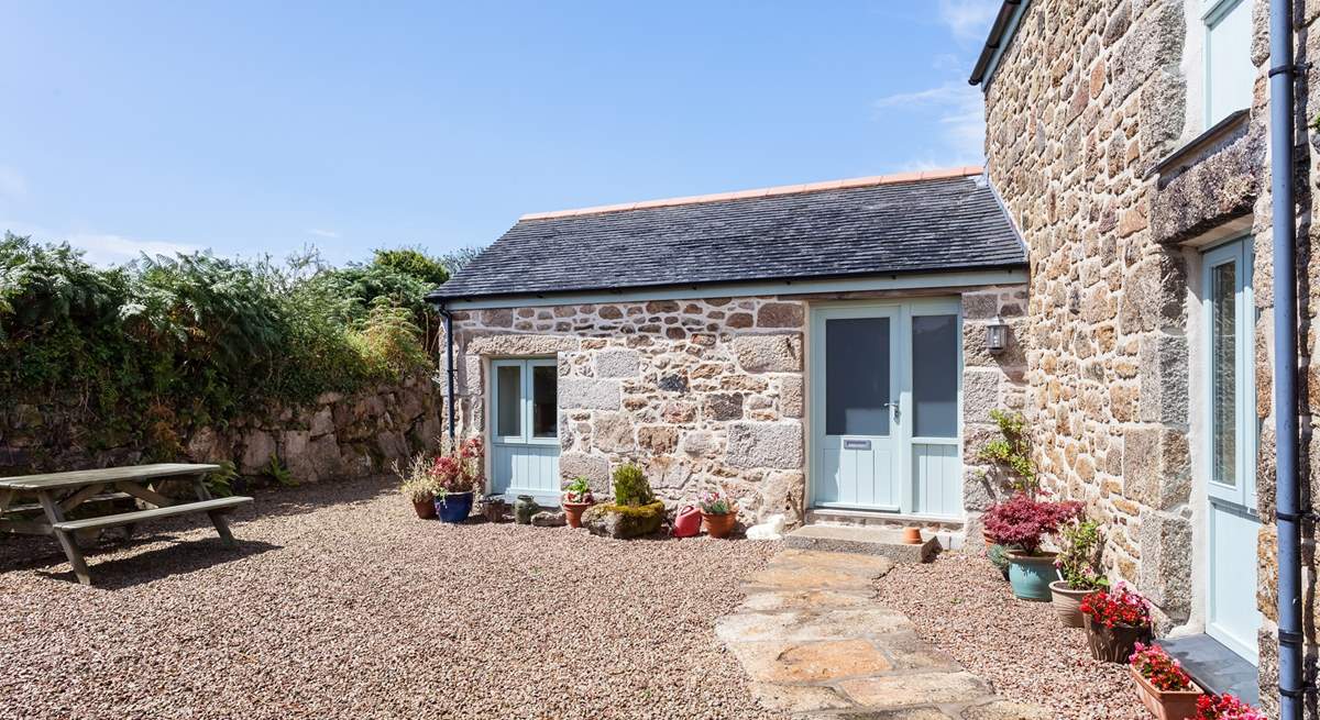 The lovely sheltered courtyard at the front of the property.