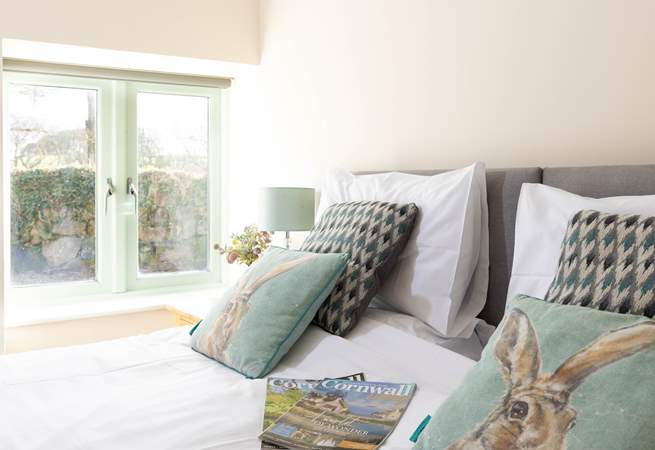 Bedroom 1 with a lovely view of the courtyard.