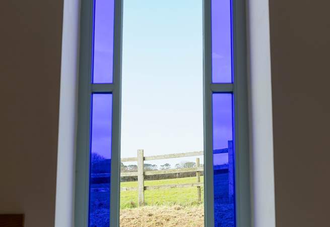 A feature stained glass window with beautiful views.