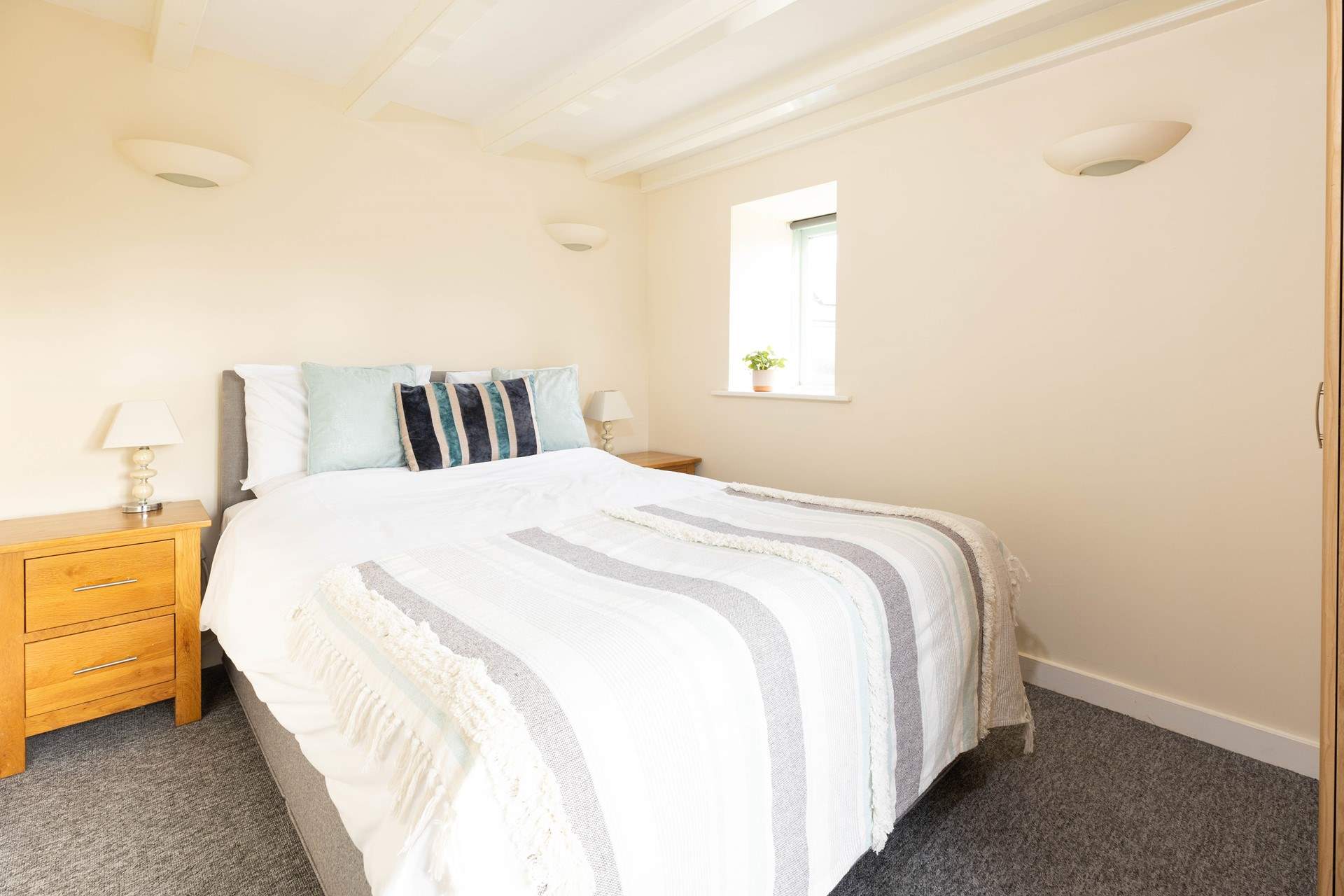 A second king-size bedroom with deep filled mattress, perfect for a tranquil nights sleep.