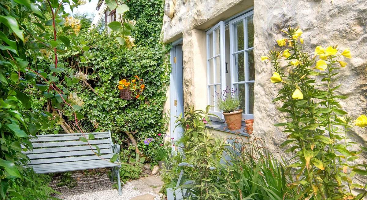 The pretty rear courtyard, the perfect place to relax.