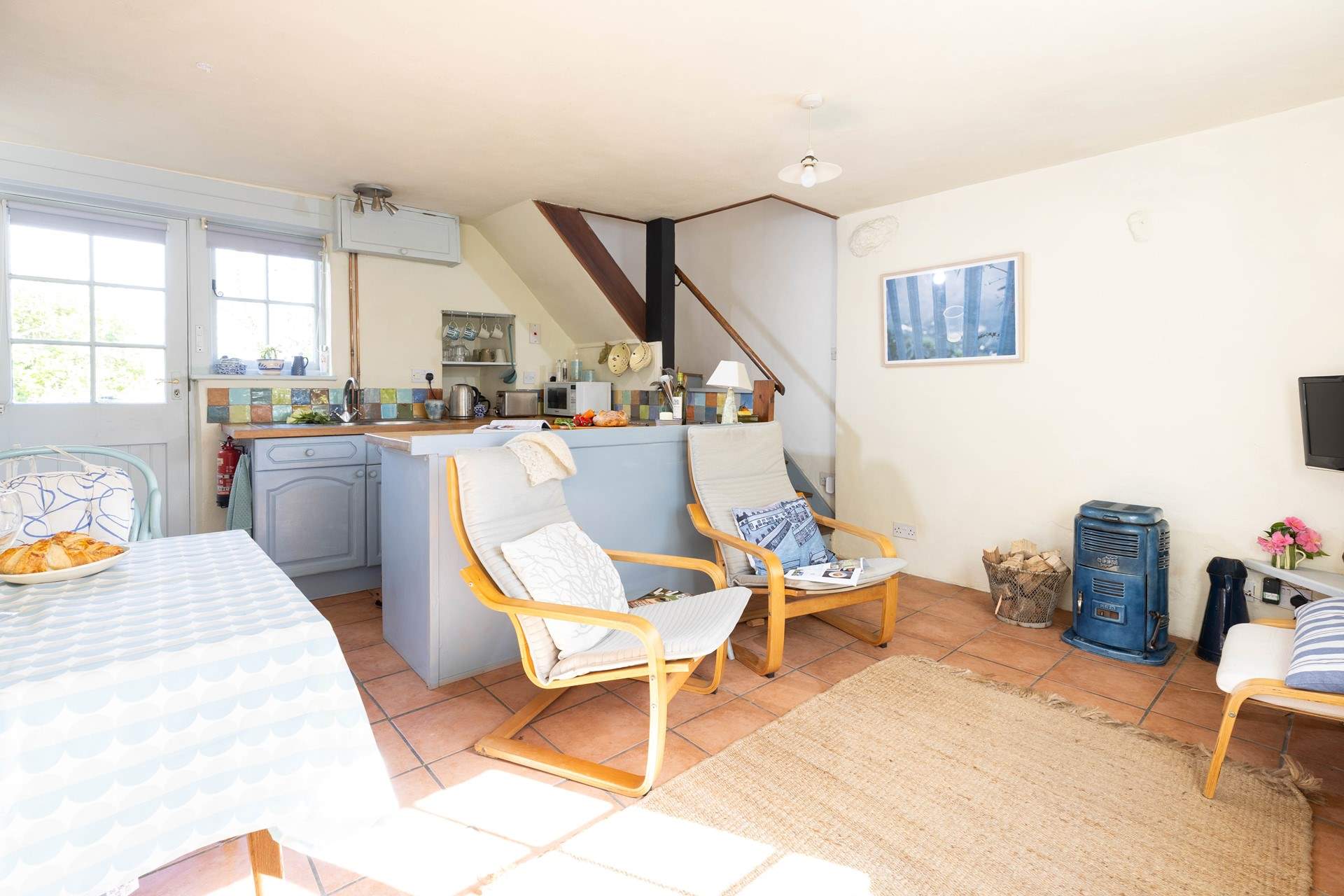 Light the cosy wood-burner on chillier evenings.