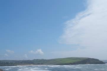 The surf rolls in.