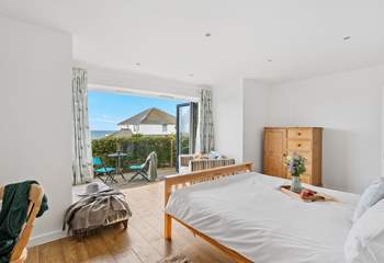 Bedroom 1 is home to a king-sized bed, with the added bonus of its very own patio-area. Perfect for enjoying a spot of breakfast in the sun.