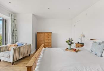 There's a super comfy chair where you can curl up with a good book.