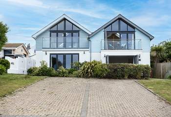 Spring Tide is the house on the right, with the balcony door open.