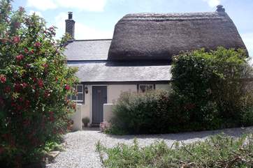 The pretty and quirky Higher Prospidnick Cottage as viewed from the front parking-area.