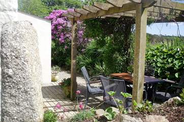 The pretty outside terrace is a lovely spot to sit and read or enjoy the company of friends and family.