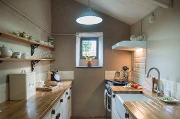 The cottage has a well-equipped galley-style kitchen.