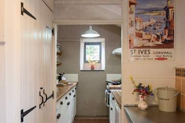Looking back to the kitchen from the utility-area.