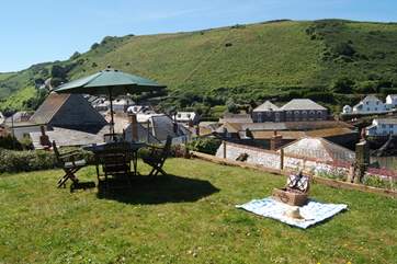 The garden has the most spectacular elevated views out across the whole bay and the village below.