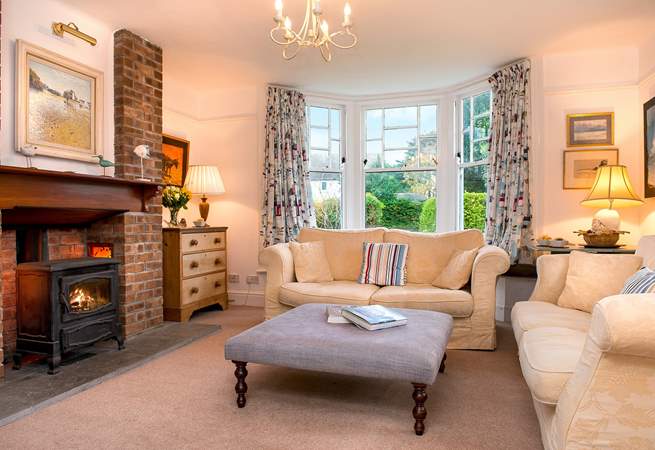 The comfy sitting-room has a lovely wood-burner making this an ideal retreat all year round.