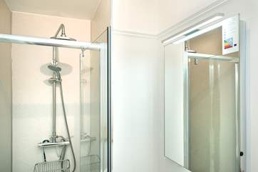 The bright and shiny en suite shower-room