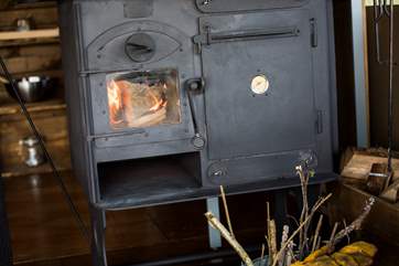 The wood-fired range doubles up as your heating and cooking appliance.