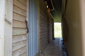 The en suite double shower-room and cloakroom can be accessed from inside the bedrooms or, for those with sandy toes, from outside.