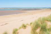 The rugged North Devon coast is also just under an hour's drive.  For a sandy beach try Instow.