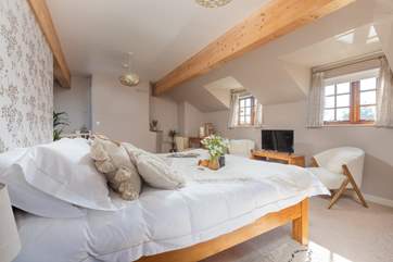 Bedroom three is a wonderfully spacious room and has its own TV, if you fancy snuggling up under the covers to catch up on your favourite programme.