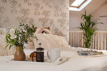 Lovely textured cushions dress the beds.