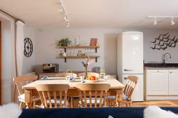 Time for tea - take a pew at the dining-table.