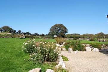 The cottage has a very large lawned garden and gravelled sitting-area.