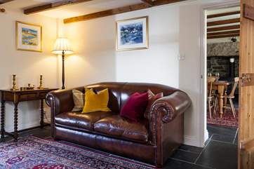 The dining-room is next to the sitting-room.