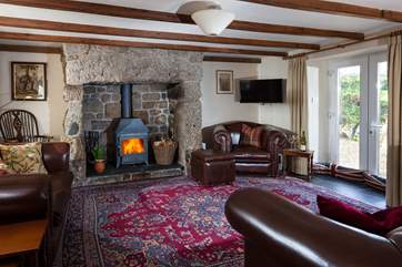 Relax in front of a roaring wood-burner