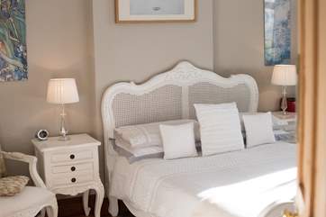 The master bedroom is beautifully decorated.
