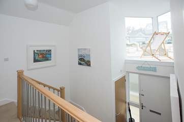 Looking from the landing outside Bedroom 1, over to the entrance door.