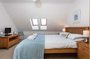 This bedroom is light and airy (Bedroom 3).