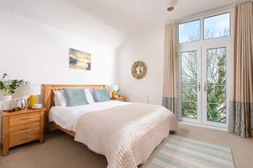 I just love the interior decor to the bedrooms, they are all so special in their own right.
Bedroom two has a private en-suite and a beautiful Juliette balcony. Open up the doors and let the Cornish sea air in whilst you enjoy your morning coffee.