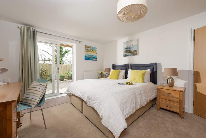 Bedroom 1 as a double, such a beautiful open space tastefully styled with lovely soft furnishings and a good sized TV.