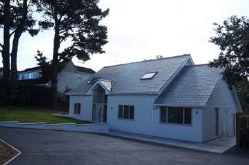 There is plenty of parking at the front of Tredhowr, and level access into the house.