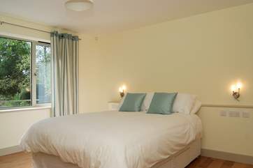 Bedroom 1 has a 5' double bed, an en suite bathroom, and is on the ground floor.